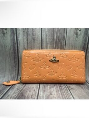 VIVIENNE WESTWOOD Peach Embossed Patent Leather Monogram Orb Heart Zip Wallet